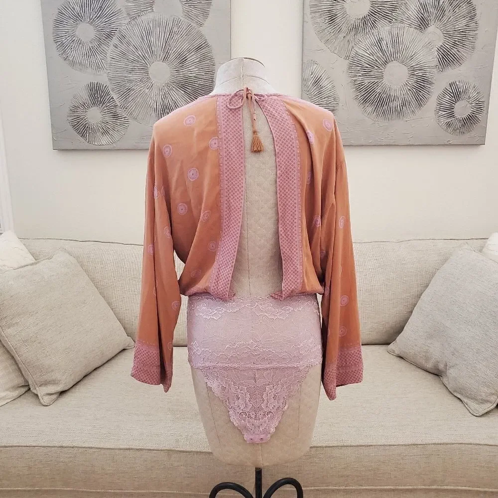 Free People On Board Bodysuit size Small in Orange/Pink